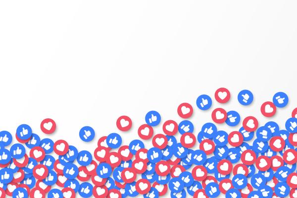 Graphic showing a large collection of social media reaction icons scattered across the bottom of the image. Blue circular icons display a white thumbs-up symbol, while red circular icons display a white heart symbol. The icons appear stacked and floating upward against a light gray background, leaving open space in the upper portion of the image for text or messaging. The design represents social media engagement, likes, and positive reactions.